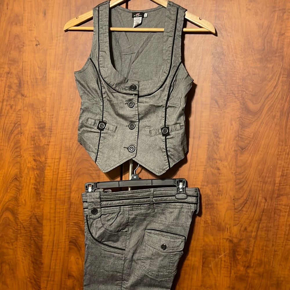 ‏ vest and pants